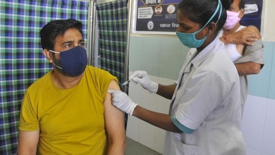 A resident getting Covid vaccine at the Sector-45 Civil Hospital in Chandigarh on Sunday. (Keshav Singh/HT)