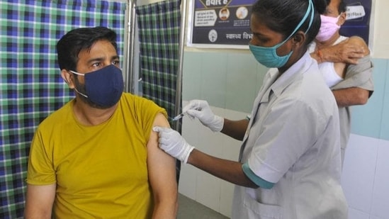 A resident getting Covid vaccine at the Sector-45 Civil Hospital in Chandigarh on Sunday. (Keshav Singh/HT) A resident getting Covid vaccine at the Sector-45 Civil Hospital in Chandigarh on Sunday. (Keshav Singh/HT)