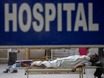 A Covid-19 patient lies outside a hospital in New Delhi. 