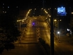 The decision was announced following a high-level meeting chaired by chief minister Vijay Rupani. In picture - Deserted street during night curfew in Surat.(ANI) The decision was announced following a high-level meeting chaired by chief minister Vijay Rupani. In picture - Deserted street during night curfew in Surat.(ANI)