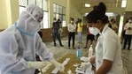 A health worker in PPE kit conducts rapid antigen Covid-19 tests, at Sukhrali Village Community Centre, in Gurugram.(Parveen Kumar/ HT file photo) A health worker in PPE kit conducts rapid antigen Covid-19 tests, at Sukhrali Village Community Centre, in Gurugram.(Parveen Kumar/ HT file photo)