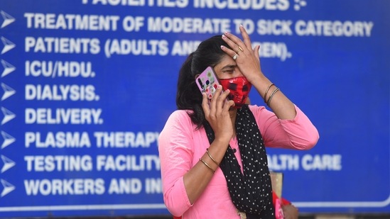 The relative of a Covid-19 patient reacts while waiting for admission outside the Lok Nayak Jai Prakash (LNJP) hospital in New Delhi on April 26. The virus has now killed more than 3.1 million people worldwide, with India driving the latest surge in global case numbers, recording over 350,000 new infections on April 26. (Amal KS / HT Photo) The relative of a Covid-19 patient reacts while waiting for admission outside the Lok Nayak Jai Prakash (LNJP) hospital in New Delhi on April 26. The virus has now killed more than 3.1 million people worldwide, with India driving the latest surge in global case numbers, recording over 350,000 new infections on April 26. (Amal KS / HT Photo)