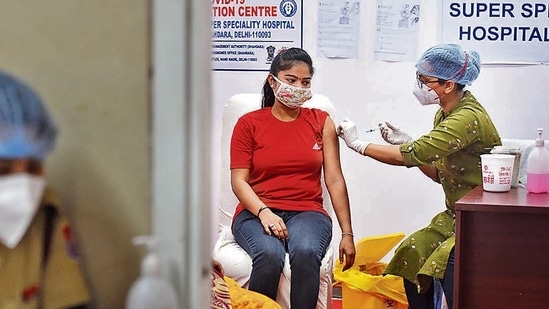 A doctor injects a beneficiary with a shot of a vaccine against the coronavirus disease (Covid-19). Photo: Raj K Raj/HT PHOTO