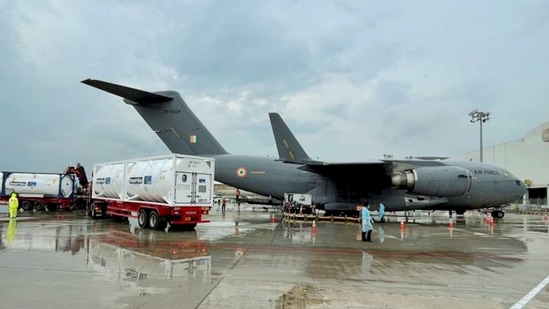 IAF C17 transport aircraft gearing up to airlift more empty oxygen containers from Singapore on April 27. India has also turned to its armed forces for help fighting the crisis as new infections have topped 300,000 since April 21. (PTI) IAF C17 transport aircraft gearing up to airlift more empty oxygen containers from Singapore on April 27. India has also turned to its armed forces for help fighting the crisis as new infections have topped 300,000 since April 21. (PTI)