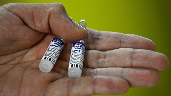 A health worker shows vials of Russian Sputnik V vaccines against Covid-19. (File Photo) A health worker shows vials of Russian Sputnik V vaccines against Covid-19. (File Photo)