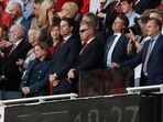 File photo of Arsenal owner Stan Kroenke in the stands with his wife, Ann Walton Kroenke