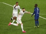 Real Madrid's Karim Benzema celebrates scoring their first goal with teammates 