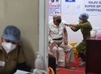 A health worker administers a dose of Covid-19 vaccine, at Rajiv Gandhi Super Specialty Hospital, in New Delhi. (Raj K Raj/ Hindustan Times) A health worker administers a dose of Covid-19 vaccine, at Rajiv Gandhi Super Specialty Hospital, in New Delhi. (Raj K Raj/ Hindustan Times)