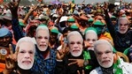 Bharatiya Janata Party (BJP) supporters wear masks of Prime Minister Narendra Modi as they gather for a rally addressed by Modi ahead of West Bengal state elections in Kolkata, India.(AP) Bharatiya Janata Party (BJP) supporters wear masks of Prime Minister Narendra Modi as they gather for a rally addressed by Modi ahead of West Bengal state elections in Kolkata, India.(AP)