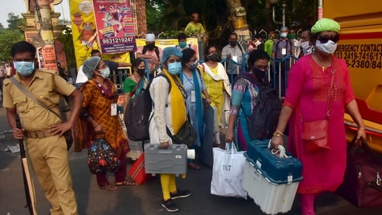Polling officials carrying EVMs and other polling materials on the eve of the 8th phase of the West Bengal Assembly election, in Kolkata on Wednesday. (ANI Photo) Polling officials carrying EVMs and other polling materials on the eve of the 8th phase of the West Bengal Assembly election, in Kolkata on Wednesday. (ANI Photo)