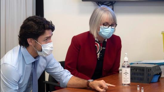 A file photo of Canadian Prime Minister Justin Trudeau and minister of health Patty Hajdu looking at vaccine vials during a visit to the Civic Hospital in Ottawa, Canada. (REUTERS/FILE) A file photo of Canadian Prime Minister Justin Trudeau and minister of health Patty Hajdu looking at vaccine vials during a visit to the Civic Hospital in Ottawa, Canada. (REUTERS/FILE)