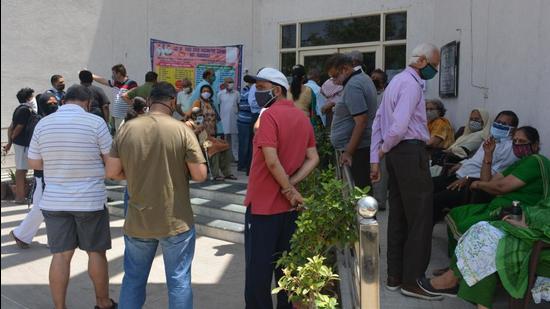 Residents awaiting their turn for vaccination at a centre in Sector 12-A, Panchkula, on Wednesday. (Sant Arora/HT) Residents awaiting their turn for vaccination at a centre in Sector 12-A, Panchkula, on Wednesday. (Sant Arora/HT)