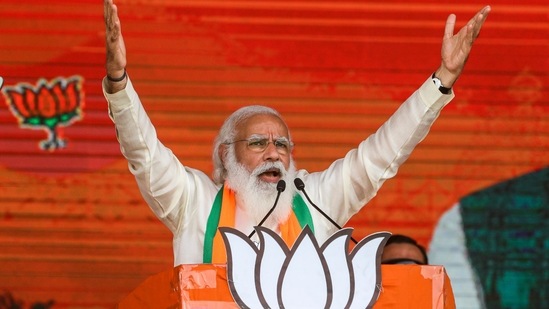 Prime Minister Narendra Modi addresses a public rally ahead of West Bengal state elections in Kolkata, India.(AP) Prime Minister Narendra Modi addresses a public rally ahead of West Bengal state elections in Kolkata, India.(AP)