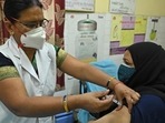 A medical worker inoculates a woman with the Covaxin Covid-19 coronavirus vaccine, at a health centre in New Delhi on April 29. (AFP) A medical worker inoculates a woman with the Covaxin Covid-19 coronavirus vaccine, at a health centre in New Delhi on April 29. (AFP)