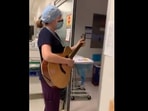 The image shows nurse Amy-Lynn Howson singing.
