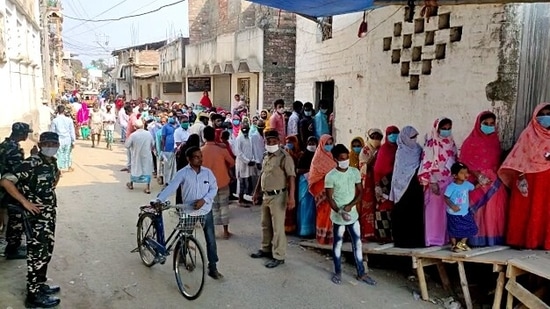 Voters stand outside a polling booth to cast their vote during the 8th and final phase of the West Bengal Assembly election.(ANI) Voters stand outside a polling booth to cast their vote during the 8th and final phase of the West Bengal Assembly election.(ANI)