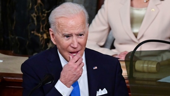 President Joe Biden marked his first 100 days in office as the nation emerges from a menacing mix of crises, making his case before a pared-down gathering of mask-wearing legislators because of pandemic restrictions. (AP) President Joe Biden marked his first 100 days in office as the nation emerges from a menacing mix of crises, making his case before a pared-down gathering of mask-wearing legislators because of pandemic restrictions. (AP)