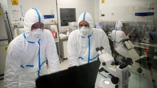 Laboratory technicians work at Valneva headquarters in Saint-Herblain, western France.(AP) Laboratory technicians work at Valneva headquarters in Saint-Herblain, western France.(AP)