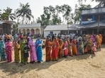 Voters in queues to cast their votes during the second phase of West Bengal Assembly polls, in Nandigram on April 1. A monthlong poll season that began with a tense political battle between the Bharatiya Janata Party (BJP) and Trinamool Congress (TMC) but was quickly overshadowed by surging Covid-19 infections came to an end on April 29 with the conclusion of the eighth phase of voting.(Ashok Bhaumik / PTI)