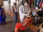 According to the health department, as many as 59,388 tests were conducted in the last 24 hours and the positivity rate in the state is at 21.4 per cent. (PTI PHOTO.) According to the health department, as many as 59,388 tests were conducted in the last 24 hours and the positivity rate in the state is at 21.4 per cent. (PTI PHOTO.)