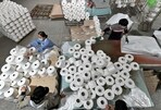 Workers are seen on the production line at a cotton textile factory in Korla, Xinjiang Uighur Autonomous Region, China(REUTERS )