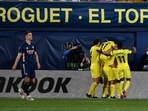 Villarreal's Raul Albiol celebrates scoring their second goal with teammates