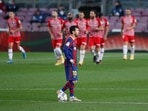Barcelona's Lionel Messi looks dejected after Granada's Jorge Molina scored their second goal.