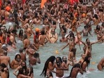 Devotees take holy dips in the Ganga River during Kumbh Mela, one of the most sacred pilgrimages in Hinduism, in Haridwar. Devotees take holy dips in the Ganga River during Kumbh Mela, one of the most sacred pilgrimages in Hinduism, in Haridwar.