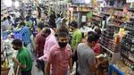Residents buying grocery items from a store hours before Ludhiana went into a weekend lockdown on Friday. (Harsimar Pal Singh/HT) Residents buying grocery items from a store hours before Ludhiana went into a weekend lockdown on Friday. (Harsimar Pal Singh/HT)