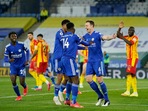 Leicester City's Jonny Evans celebrates scoring their second goal with teammates.
