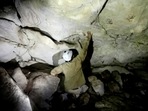 Archeologist Sergio Grosjean explores a cave with hand prints, reportedly 1,200 years old, in Merida, Mexico.