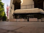 American flags outside the J. Edgar Hoover Federal Bureau of Investigation (FBI) building stands in Washington, DC. (Bloomberg) American flags outside the J. Edgar Hoover Federal Bureau of Investigation (FBI) building stands in Washington, DC. (Bloomberg)