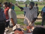 A counting agent being tested at a vote counting centre.