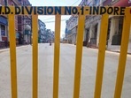 Indore street wears a deserted look after authorities imposed restrictions to curb the spread of coronavirus. (PTI Photo)