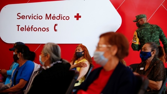Elderly people wait in an observation room after receiving the AstraZeneca coronavirus disease (COVID-19) vaccine, during a mass vaccination program in Ciudad Juarez, Mexico. (REUTERS) Elderly people wait in an observation room after receiving the AstraZeneca coronavirus disease (COVID-19) vaccine, during a mass vaccination program in Ciudad Juarez, Mexico. (REUTERS)