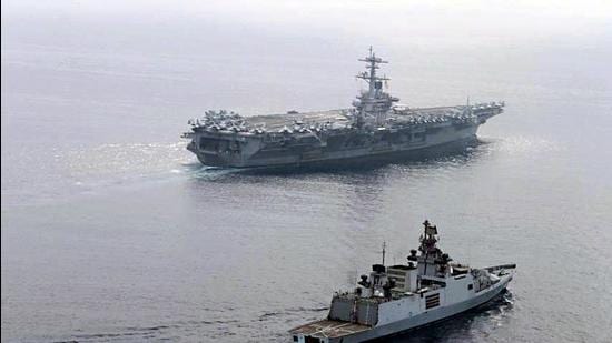 In this file photo, INS Shivalik with integral helicopter and Long Range Maritime Patrol Aircraft P8I participated in a Passage Exercise (PASSEX) with US Navy's USS Theodore Rosevelt Carrier Strike Group in the Eastern Indian Ocean Region. (ANI)