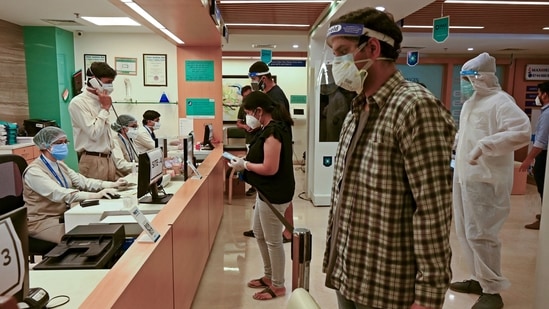 People register to receive a dose of the Covishield, AstraZeneca-Oxford's Covid-19 coronavirus vaccine, at Max hospital in New Delhi.(AFP) People register to receive a dose of the Covishield, AstraZeneca-Oxford's Covid-19 coronavirus vaccine, at Max hospital in New Delhi.(AFP)