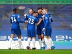 Chelsea's Kai Havertz celebrates scoring their first goal with teammates.