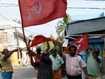 Left supporters celebrate the party’s win in Kerala. (ANI Photo) Left supporters celebrate the party’s win in Kerala. (ANI Photo)