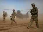 US soldiers, part of the NATO- led International Security Assistance Force (ISAF) patrol west of Kabul, Afghanistan in this file photo. 