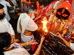 Mamata Banerjee visited Kalighat temple on Sunday, (PTI) Mamata Banerjee visited Kalighat temple on Sunday, (PTI)