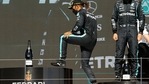 Mercedes' Lewis Hamilton steps onto the podium after winning the race REUTERS/Marcelo Del Pozo(REUTERS)