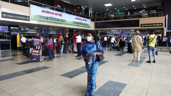 A woman wears a protective face mask due to the spread of Covid-19 at the Murtala Mohammed International airport in Lagos, Nigeria. (Reuters / File)