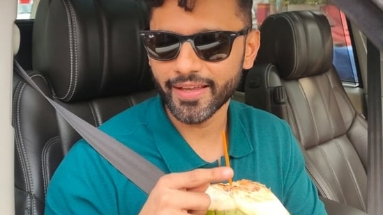 Rahul Vaidya enjoys coconut water on a hot summer day in Mumbai.(Varinder Chawla)