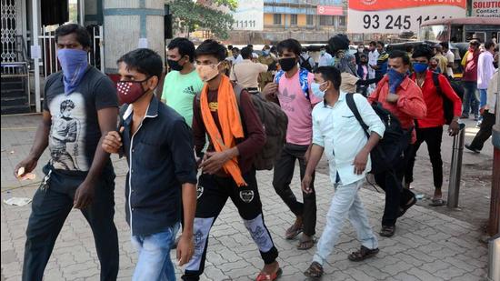 On Sunday, 50 migrant labourers, with their luggage, were seen at Amritsar Railway Station to board trains bound for UP and Bihar. They were carrying bags. (HT file)