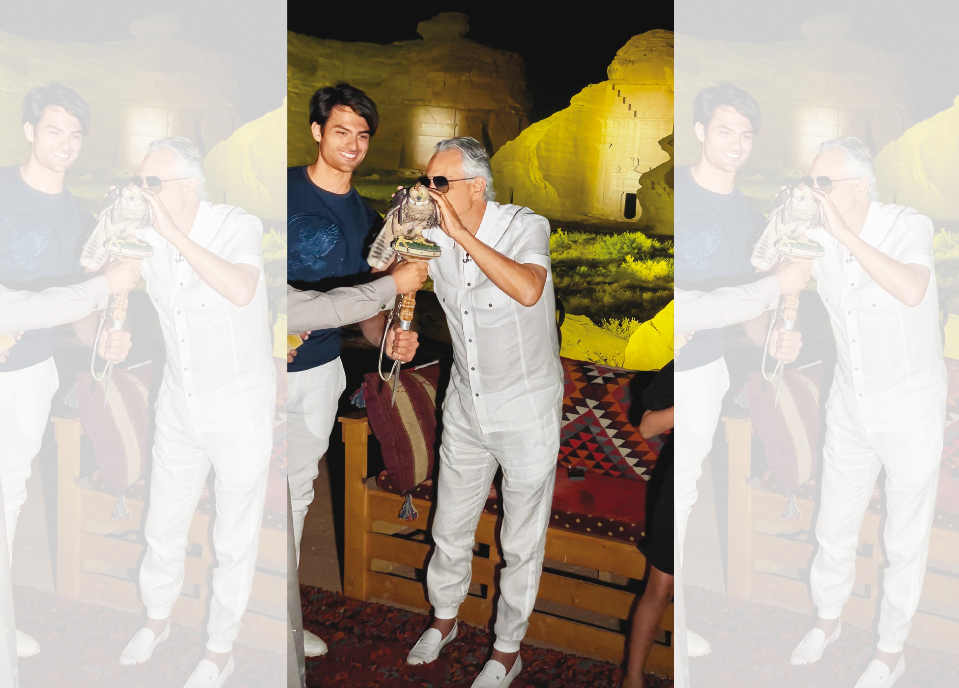 Bocelli kissing a desert falcon a night before his concert at the UNESCO world heritage site Bocelli kissing a desert falcon a night before his concert at the UNESCO world heritage site