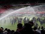 Manchester United fans protest against their owners before the Manchester United v Liverpool Premier League match on Sunday