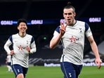 Tottenham Hotspur's Gareth Bale celebrates scoring their third goal and completes his hat-trick.