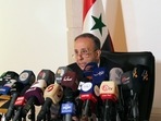 Head of the higher constitutional court, Jihad Al Laham, speaks during a news conference in Damascus, Syria May 3, 2021. 