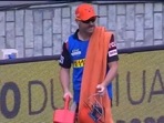 David Warner carrying drinks during the match against Rajasthan Royals on Sunday